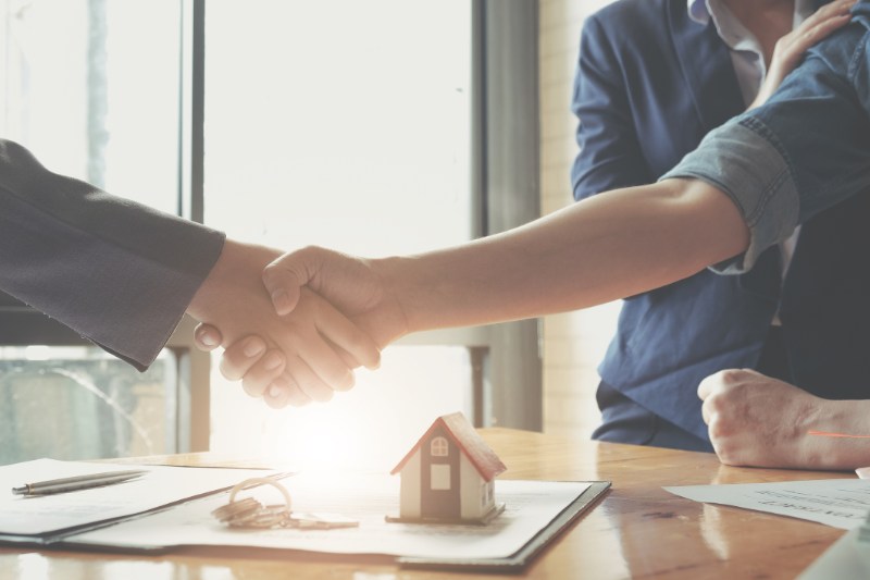 Real estate agents agree to buy a home